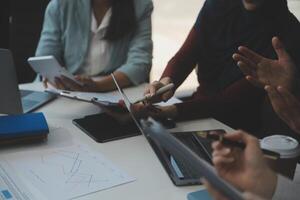 Team of business people working together in the meeting room office, teamwork background charts and graphs banner, double exposure successful teamwork,business planning concept. photo