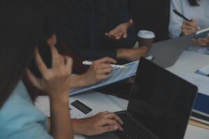 Team of business people working together in the meeting room office, teamwork background charts and graphs banner, double exposure successful teamwork,business planning concept. photo