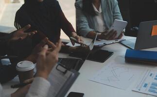 Team of business people working together in the meeting room office, teamwork background charts and graphs banner, double exposure successful teamwork,business planning concept. photo