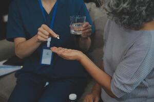 Doctors are giving advice on medication to patients in hospital examination rooms, treating diseases from specialists and providing targeted treatment. Concepts of medical treatment and specialists. photo
