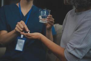 Doctors are giving advice on medication to patients in hospital examination rooms, treating diseases from specialists and providing targeted treatment. Concepts of medical treatment and specialists. photo