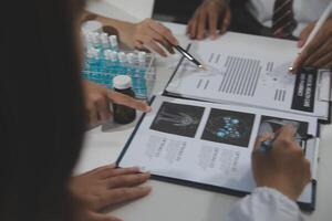 Group of professional medical doctor team meeting training medical in uniform working discussing and talk with patients record, teaching medic team, sit in hospital.health medical care concept photo