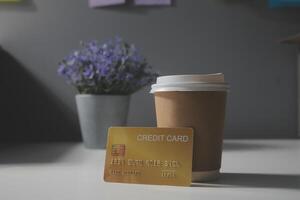 close up on calculator with group of mail letter and credit card at white table for end of the month expense day concept photo