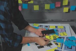 ux Graphic designer creative sketch planning application process development prototype wireframe for web mobile phone . User experience concept. photo