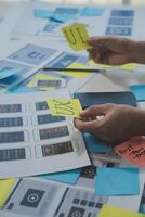 ux Graphic designer creative sketch planning application process development prototype wireframe for web mobile phone . User experience concept. photo