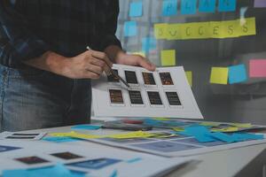 ux Graphic designer creative sketch planning application process development prototype wireframe for web mobile phone . User experience concept. photo