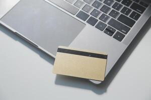 Calculator on a dark background, plastic cards and banknotes photo