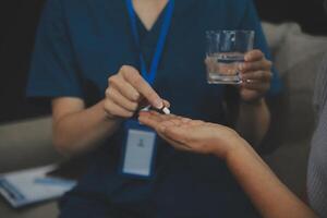 Doctors are giving advice on medication to patients in hospital examination rooms, treating diseases from specialists and providing targeted treatment. Concepts of medical treatment and specialists. photo