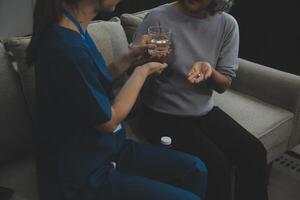 Doctors are giving advice on medication to patients in hospital examination rooms, treating diseases from specialists and providing targeted treatment. Concepts of medical treatment and specialists. photo