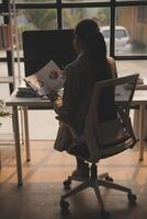 Team of business people working together in the meeting room office, teamwork background charts and graphs banner, double exposure successful teamwork,business planning concept. photo