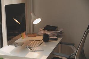 messy office workspace. Messy and cluttered office desk. Messy business office with piles of files and disorganized clutter. photo