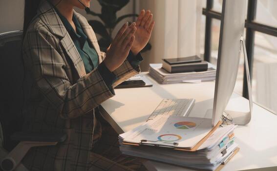 Call center, computer and business with woman in office for customer service, technical support and advice. Technology, contact us and communication with employee operator in help desk agency photo