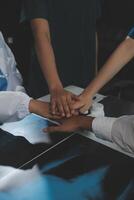 Doctor handshake and partnership in healthcare, medicine or trust for collaboration, unity or support.Team of medical experts shaking hands in teamwork for or success in hospital photo