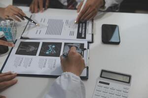 Group of professional medical doctor team meeting training medical in uniform working discussing and talk with patients record, teaching medic team, sit in hospital.health medical care concept photo