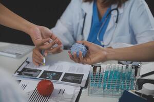 Group of professional medical doctor team meeting training medical in uniform working discussing and talk with patients record, teaching medic team, sit in hospital.health medical care concept photo