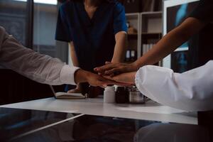 Doctor handshake and partnership in healthcare, medicine or trust for collaboration, unity or support.Team of medical experts shaking hands in teamwork for or success in hospital photo
