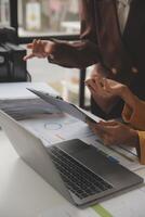 Team of business people working together in the meeting room office, teamwork background charts and graphs banner, double exposure successful teamwork,business planning concept. photo