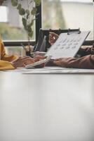 Team of business people working together in the meeting room office, teamwork background charts and graphs banner, double exposure successful teamwork,business planning concept. photo