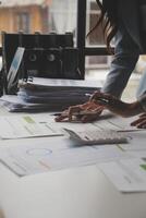 Team of business people working together in the meeting room office, teamwork background charts and graphs banner, double exposure successful teamwork,business planning concept. photo