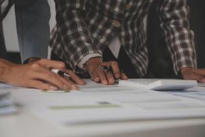 Team of business people working together in the meeting room office, teamwork background charts and graphs banner, double exposure successful teamwork,business planning concept. photo