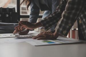 Team of business people working together in the meeting room office, teamwork background charts and graphs banner, double exposure successful teamwork,business planning concept. photo