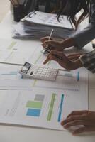 Team of business people working together in the meeting room office, teamwork background charts and graphs banner, double exposure successful teamwork,business planning concept. photo