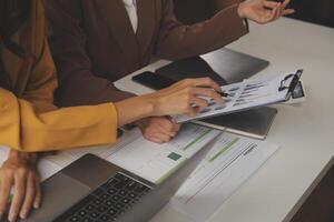 Team of business people working together in the meeting room office, teamwork background charts and graphs banner, double exposure successful teamwork,business planning concept. photo