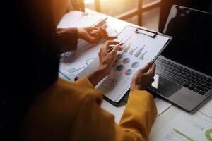 Team of business people working together in the meeting room office, teamwork background charts and graphs banner, double exposure successful teamwork,business planning concept. photo