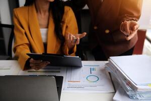 Team of business people working together in the meeting room office, teamwork background charts and graphs banner, double exposure successful teamwork,business planning concept. photo