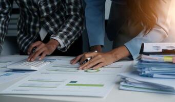 Team of business people working together in the meeting room office, teamwork background charts and graphs banner, double exposure successful teamwork,business planning concept. photo