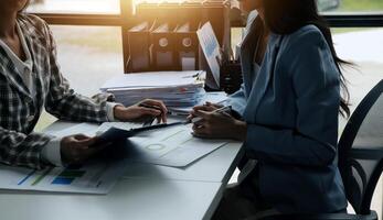 Team of business people working together in the meeting room office, teamwork background charts and graphs banner, double exposure successful teamwork,business planning concept. photo