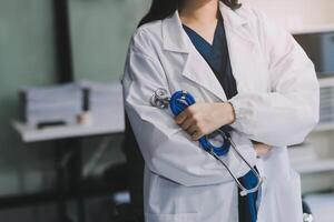 Photographic image of doctor holding stethoscope photo
