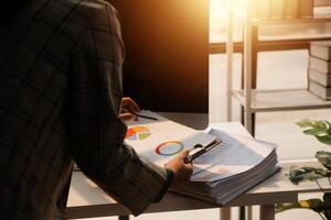 Team of business people working together in the meeting room office, teamwork background charts and graphs banner, double exposure successful teamwork,business planning concept. photo