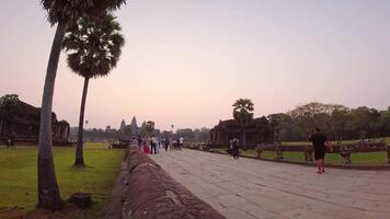 Beautiful sunrise with colorful sky at Angkor Wat - Temple City. World heritage site, a temple complex in Siem Reap, Cambodia, the largest. Visitors by Seventh wonder landmark video