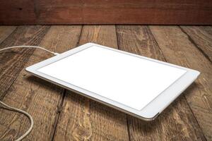 mockup of digital tablet with a blank isolated screen photo