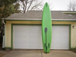 inflatable stand up paddleboard with paddle photo