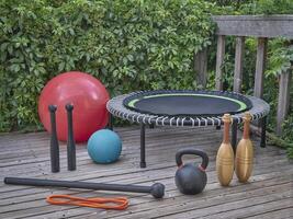 home gym concept on a backyard patio photo