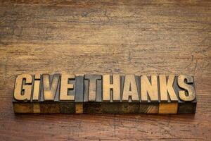 Give thanks word abstract in letterpress wood type photo