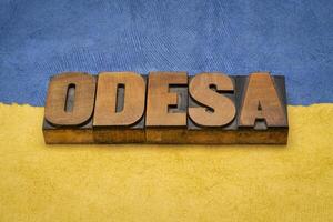Odesa word abstract in wood type photo