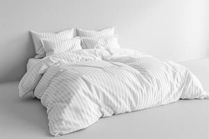 comfortable bed, white sheets and pillows in a room, featuring flooring and a rectangular bed frame photo