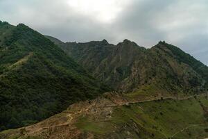 Caucasian mountain. Dagestan. Trees, rocks, mountains, view of the green mountains. Beautiful summer landscape. photo