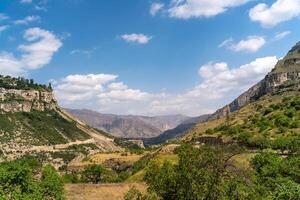 Caucasian mountain Dagestan. Trees, rocks, mountains, view of the green mountains. Beautiful summer landscape. photo