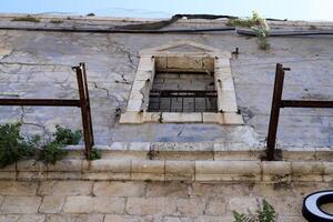 A small window as an architectural detail of housing construction in Israel. photo