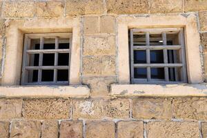 A small window as an architectural detail of housing construction in Israel. photo