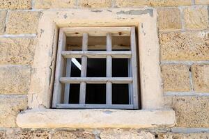 A small window as an architectural detail of housing construction in Israel. photo