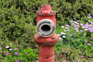 Water tap and pipes for pumping water to the pumping station. photo