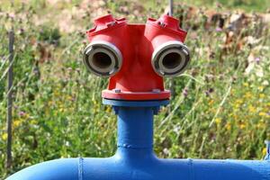 Metal water pipes and taps photo
