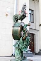 Figures and statues for children in the city park. photo