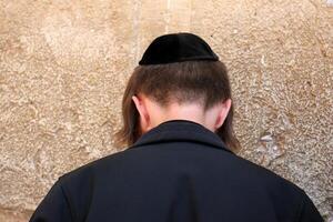 07 13 2023 Jerusalem Israel. The Western Wall is part of the ancient wall around the western slope of the Temple Mount in the Old City of Jerusalem. photo