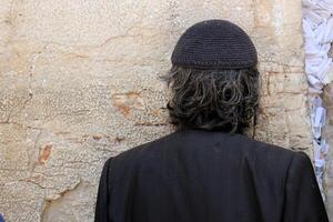 07 13 2023 Jerusalem Israel. The Western Wall is part of the ancient wall around the western slope of the Temple Mount in the Old City of Jerusalem. photo